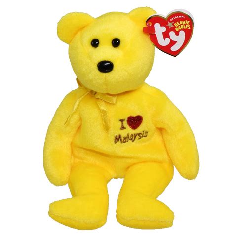 yellow beanie baby bear.